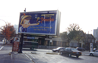 The Penthouse -- Rotating billboard ad for Disney's Pinnochio, now out on DVD. PHOTO: Andy Sorfleet, Summer, 1999.