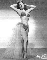 Val began her career in exotic dancing working as a chorus girl for Raynell Golden in 1955. Tutored by Mitzi, she soon became a feature act and by 1958 was headlining the burlesque theater circuit as 