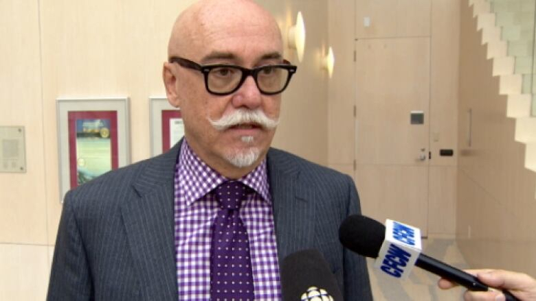 Coun. Scott McKeen wants council to place a new temporary moratorium on business licenses for body rub or adult massage parlours. (CBC)
