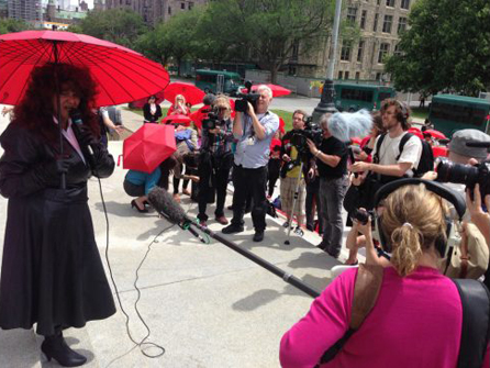 Terri Jean Bedford speaks to prostitution supporters and reporters at the Canadian Supreme Court in Ottawa on June 13, 2013. The court heard arguments for effectively legalizing prostitution, after a lower court quashed portions of a law banning brothels and living off the avails of prostitution. PHOTO: MICHEL COMTE/AFP/GETTY IMAGES