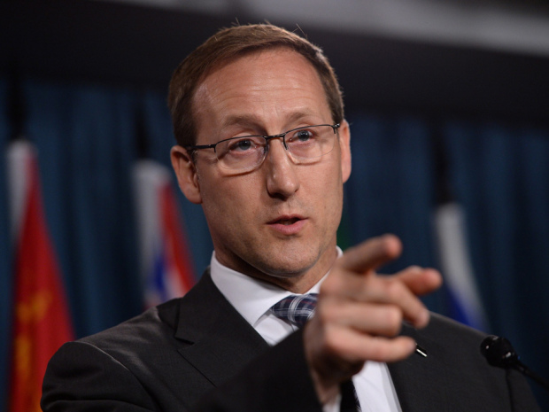 Justice Minister Peter MacKay takes questions a news conference on Parliament Hill in Ottawa on Wednesday, June 4, 2014. The Conservative government has introduced legislation to criminalize the purchase of sexual services. PHOTO: Sean Kilpatrick, National Post