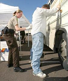 A Maricopa County Detention Officer frisks a suspected john.