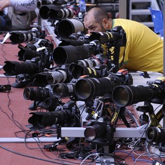 Cameras are seen during the Athletics event at the National stadium as part of the 2008 Beijing Olympic Games on August 16, 2008. PHOTO: Michael Kappeler/AFP/Getty Images