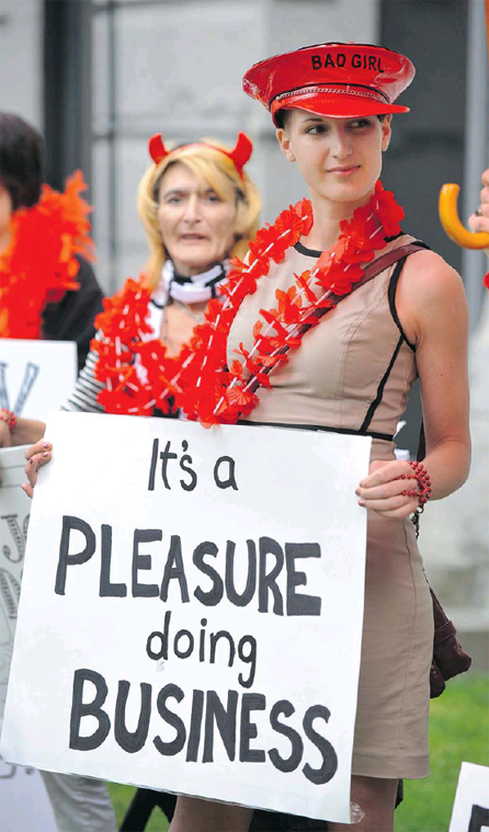 Supporters gather at the start of a march in downtown Vancouver in a show of solidarity for the three former sex-trade workers who are challenging Canada's prostitution laws. PHOTO: Arlen Redekop, Png, The Province.