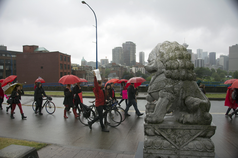 In Vancouver, sex worker rights activists brave the weather. June 14, 2014. PHOTO: Philip Lo