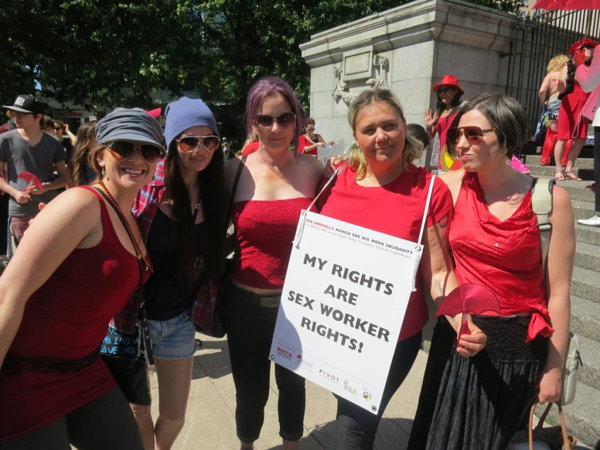 Supporters of sex workers wore red to yesterday's march. Photo: Charlie Smith