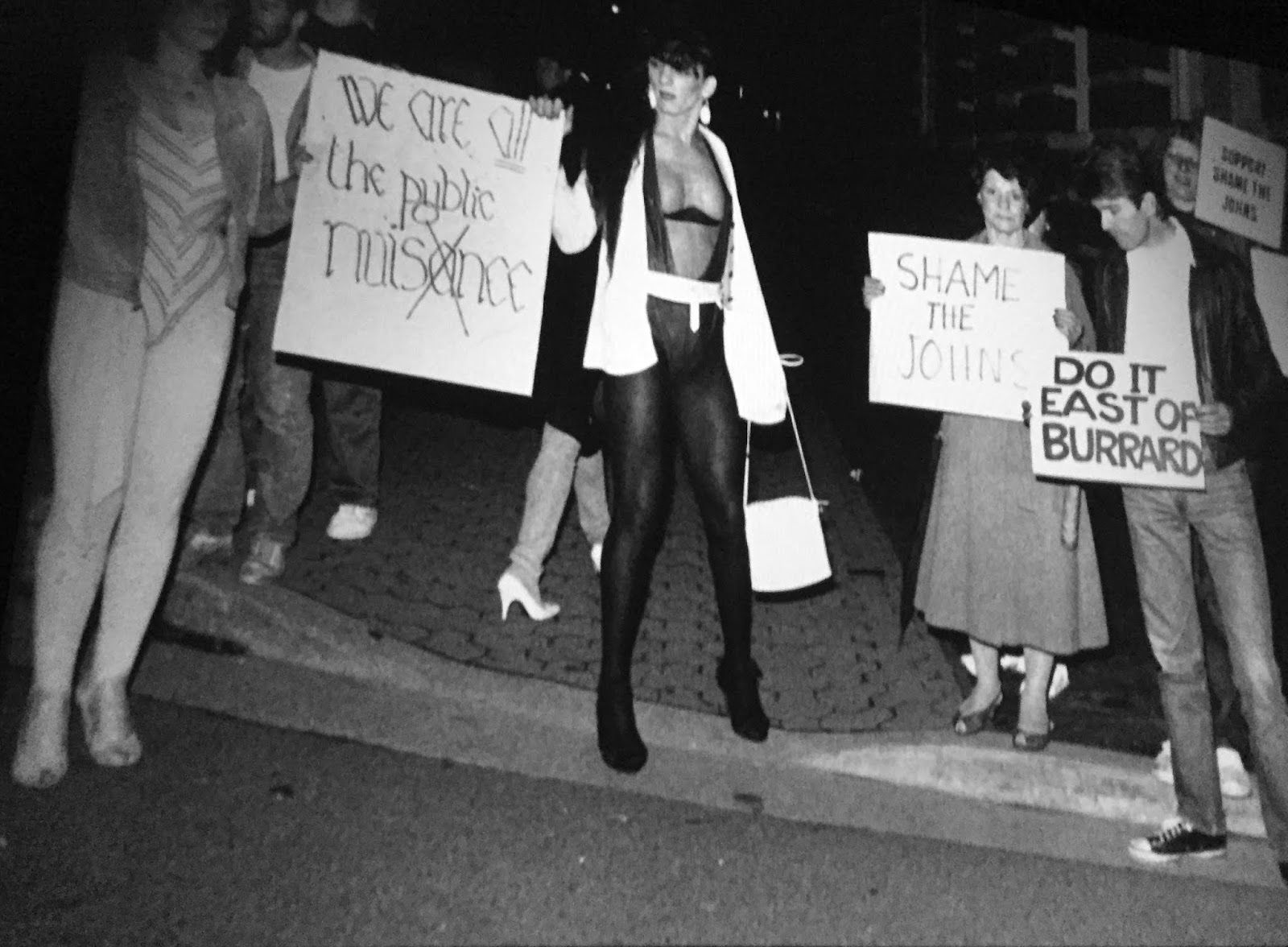 Alliance for the Safety of Prostitutes counter-pickets the Shame the Johns protest, Friday night, June 8, 1984.
