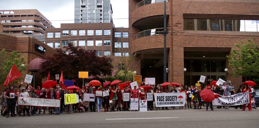 Red Umbrella March 2019 outside Pacific Cinematheque on Howe Street. Vancouver, June 8, 2019. Photo by Bill M. Powers