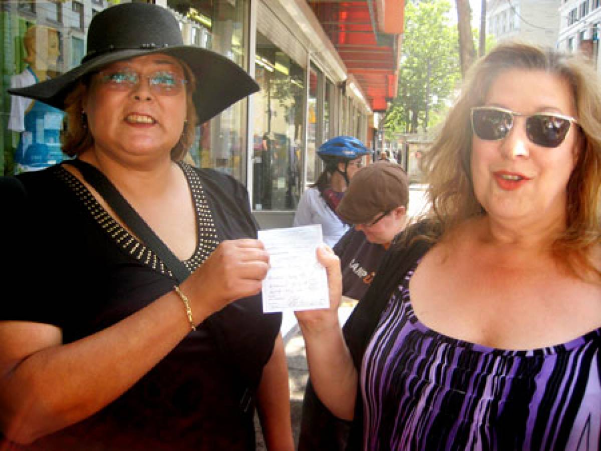 In 2009, Jamie Lee Hamilton (right) participated in a trans protest outside Lu's Pharmacy, which was restricting service to 'women born women.' PHOTO: Charlie Smith