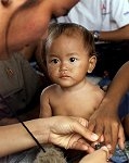 A street baby in Cambodia, which is gaining a reputation as a haven for child sex -- AP